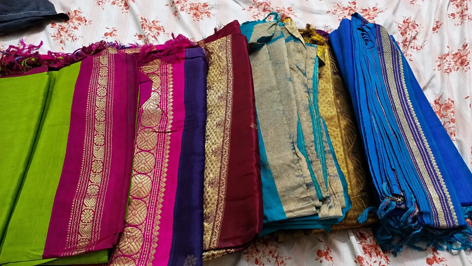 Second hand silk saree buyers Chennai — assorted old pattu sarees lined up for valuation
