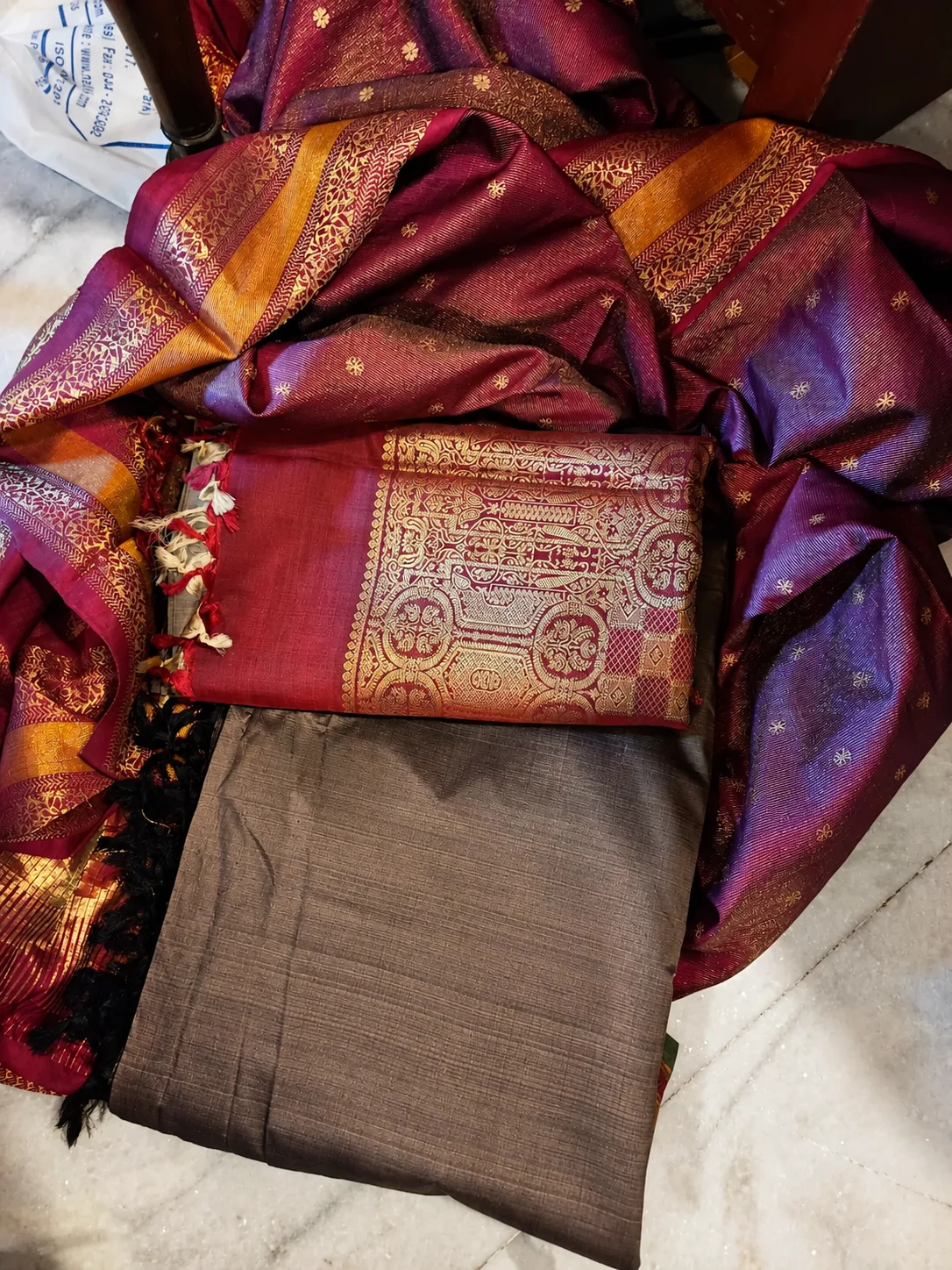 Cash for old silk sarees along OMR Chennai — maroon and purple silk sarees bundled for pickup
