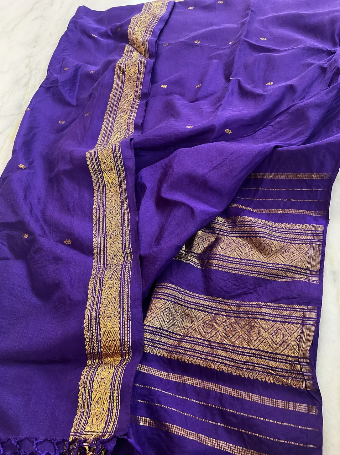 Old zari saree buyers in Adyar Chennai — deep purple silk saree with gold zari border